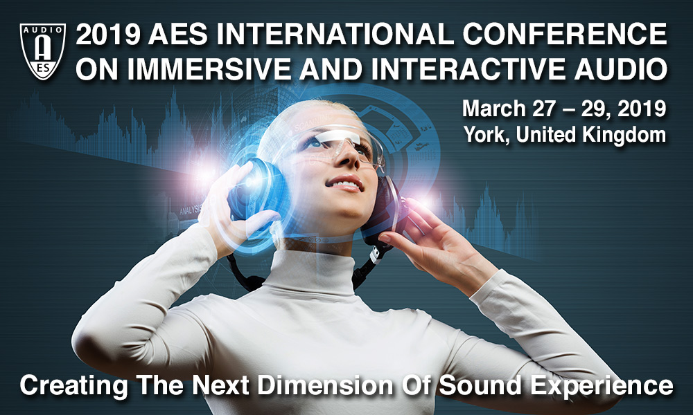 A women in white is wearing headphones and looking up. Text above her head says '2019 AES International Conference on Immersive and Interactive Audio. March 27-29, 2019. York, UK.