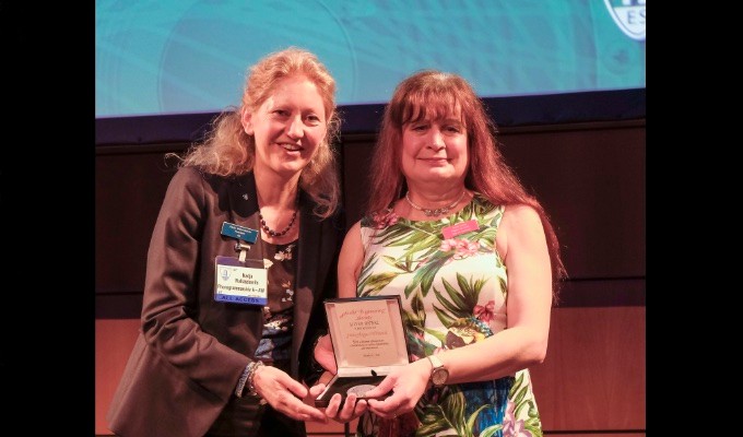 AES President Nadja Wallaszkovits presents the prestigious AES Silver Medal to AES Fellow Jamie A. S. Angus-Whiteoak for a lifetime of important contributions to audio engineering and instruction, and for outstanding achievement in the field of audio engineering.